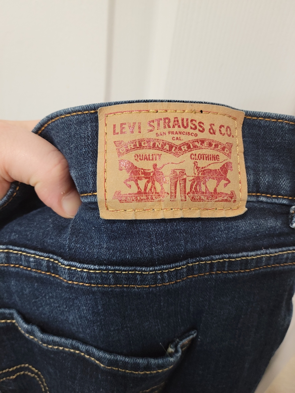 Levi's High-Waist Dark Blue Bootcut Jeans - Picture 8 of 16
